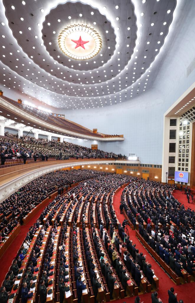 3月11日，第十四屆全國人民代表大會第二次會議在北京人民大會堂舉行閉幕會。新華社記者 丁林 攝